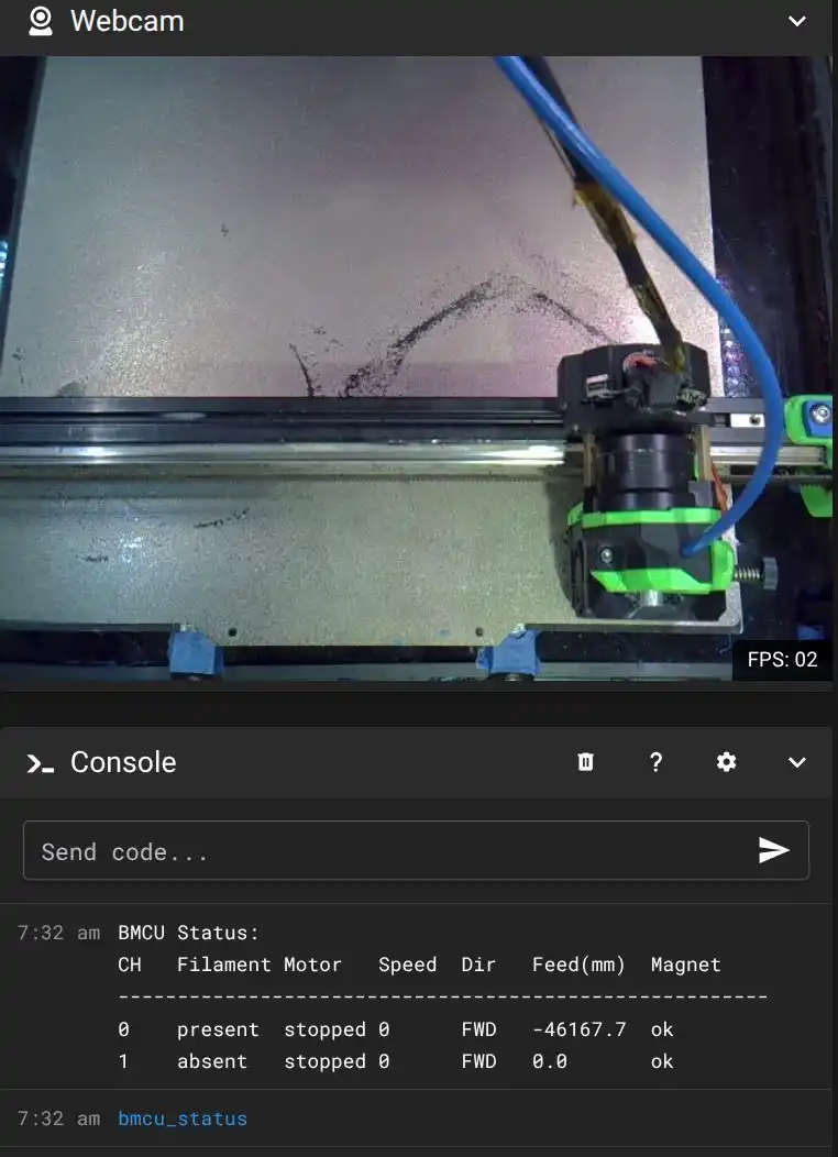 A screenshot of a web interface. The upper Webcam panel shows a printer toolhead on a gantry above a print bed marked with dark spatter, with an FPS: 02 badge. The lower Console panel shows bmcu_status run at 7:32 am returning a two-row table — channel 0: filament present, motor stopped, direction FWD; channel 1: filament absent, motor stopped, direction FWD.